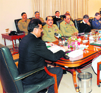 Pakistan PM Yousuf Raza Gilani (L) chairs the defence committee meeting on Saturday. 