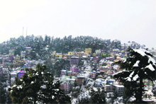 A view of Dharamshala town after heavy snowfall on Friday.