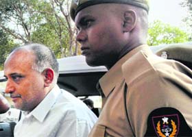 Emaar MGF South India Finance Head G Vijay Raghavan being taken to Chanchalguda Jail in Hyderabad