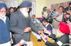 CM Parkash Singh Badal casts his vote at Badal village