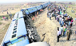 Derailed coaches of the Chilarai passenger train near Guwahati on Friday. 
