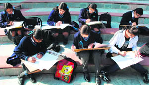 Students take part in an inter-school painting competition to mark the birth anniversary of Rabindranath Tagore at Strawberry Fields World School in Chandigarh on Thursday.