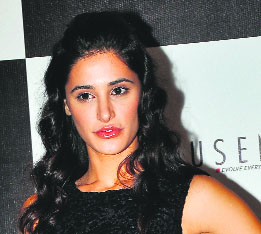 Nargis Fakhri will perform at an awards function for the first time and she is very excited about it. She is practicing hard and will dance to Rockstar's songs. Dancing diva: Nargis Fakhr