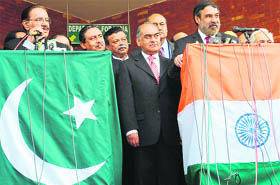 Commerce Minister Anand Sharma (right) and his Pakistani counterpart Makhdoom Amin Fahim talk to media at the Wagah border on Monday. 
