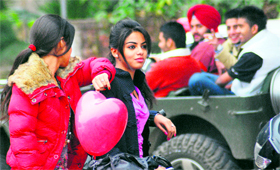 Youngsters hang around ‘geri’ route in Sector 10 on Valentine’s Day in Chandigarh on Tuesday.