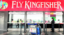 A passenger at a Kingfisher Airlines booking counter in Mumbai on Tuesday.