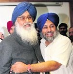 Sukhbir hugs his father Parkash Singh Badal after the latter was elected leader of the SAD-BJP alliance. 