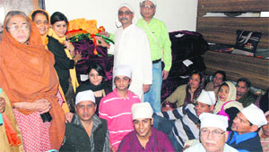 Dr Arun Dhup, a resident of Delhi, along with members of his family, who offered Darshani cover at Guru Ram Rai Darbar in Dehradun on Monday. 