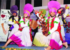 Students present a folk dance during cultural fest Spontania-12 at Swami Vivekanand Institute of Engineering and Technology in Ramnagar on Wednesday