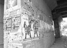 Posters pasted on a wall at Sector 21 in Panchkula