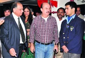 Actor Anupam Kher (centre) at Vivek High School in Sector 38, Chandigarh, on Wednesday