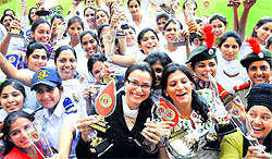 Girls in a happy mood after receiving their prizes at the annual prize distribution function of Shri Gobind Singh College for Women, Sector 26, Chandigarh, on Thursday