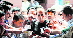 Rail Minister Dinesh Trivedi talks to mediapersons in New Delhi on Thursday.
