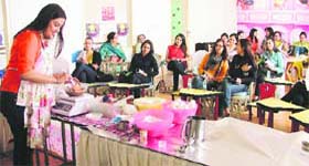 Vibha Pahwa gives a demonstration during a cooking workshop at Kangaroo Kids in Ludhiana on Thursday