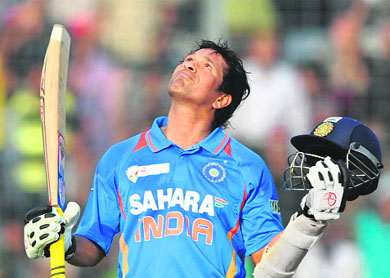 Sachin Tendulkar reacts after scoring his 100th century during the Asia Cup match between India and Bangladesh in Dhaka on Friday.