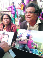 Grandparents of Abhigyan and Aishwarya during a protest.