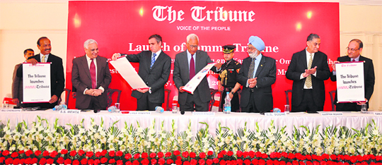 From left: Raj Chengappa, Editor-in-Chief, The Tribune; Lt Gen SS Mehta (retd), Tribune Trustee; Omar Abdullah, Chief Minister; NN Vohra, Governor; Justice SS Sodhi (retd), Tribune Trustee; Naresh Mohan, Tribune Trustee; and Sanjay Hazari, General Manager, The Tribune, during the launch of Jammu Tribune at Royal Retreat, Hari Niwas Palace, in Jammu on Friday.