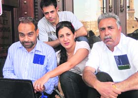 THE CREW: Mohd Urfi (L), a Pakistani journalist, and Pawan Bali, a Jammu-based woman scribe, with their team