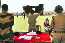 A BSF jawan with protective gear at a recruitment rally in Akhnoor.