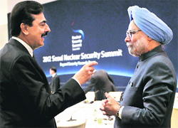 Prime Minister Manmohan Singh with Pakistani counterpart Yousuf Raza Gilani at the nuclear summit in Seoul on Tuesday. 
