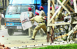 Policemen battle to control a mob at Gurdaspur