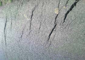 The newly constructed stretch of the Canal Road has developed fissures