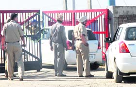 A policeman salutes an SGPC member visiting Bibi Jagir Kaur at the Modern Jail in Kapurthala on Wednesday