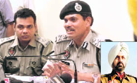  Ludhiana Police Commissioner Ishwar Singh (R) addresses the media on Thursday. (Inset) Slain DSP Balraj Singh Gill. 
