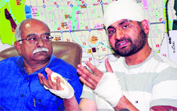 Navneet Singh shares details of his kidnapping with mediapersons at the Sector 9 police headquarters in Chandigarh. On the left is IG police PK Srivastava.
