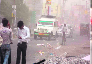 People caught in dust storm that lashed Haridwar on Wednesday. 