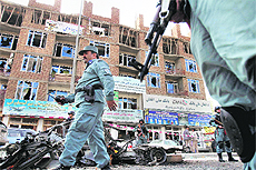 Afghan troops near the building used by militants to launch attacks in Kabul.