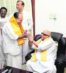 Defence Minister A K Antony greets DMK chief M Karunanidhi in Chennai on Sunday.