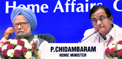 Prime Minister Manmohan Singh with Union Home Minister P Chidambaram at the Chief Ministers conference on NCTC in New Delhi on Saturday.