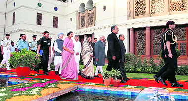 President Pratibha Patil, Vice-President Hamid Ansari, Prime Minister Manmohan Singh, Speaker Meira Kumar and minister Pawan Kumar Bansal arrive for a special sitting at Parliament House in New Delhi on Sunday