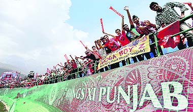 Cricket enthusiasts during the IPL T20 match between Kings XI Punjab and Delhi Daredevils at the HPCA stadium in Dharamsala on Saturday. Daredevils registered a six-wicket win over Kings XI to push them out of the IPL.