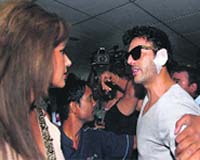 Sahil Peerzada, who was allegedly assaulted by Luke Pomersbach, after being discharged from hospital and his fiancee Zohal Hamid in New Delhi on Monday