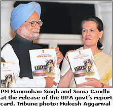 PM Manmohan Singh and Sonia Gandhi at the release of  the UPA govts report card.