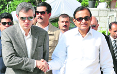 Jammu and Kashmir CM Omar Abdullah with Union Home Minister P Chidambaram in Srinagar on Wednesday. 