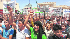 Demonstrators protest against Syrias President Bashar al-Assad in Binsh near Idlib.  Reuters 