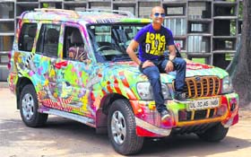 Manil Gupta poses with his Love machine Photo: S Chandan