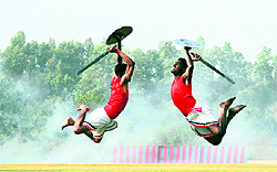 Two gentlemen cadets display kalaripayattu, Kerala’s martial art, on the eve of the passing-out parade at the Indian Military Academy in Dehradun on Friday