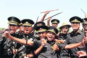 Gentlemen cadets of the Indian Military Academy rejoice after the passing-out parade in Dehradun on Saturday