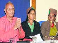 Avdhesh Kaushal (L), chairman of a Dehradun-based NGO, and Surtama Rawat, address the media in New Delhi