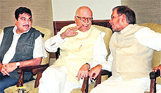 Nitin Gadkari, LK Advani and JD (U)s Sharad Yaday at the NDA meeting on Sunday. 
