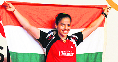 Saina Nehwal with the Tricolour after defeating Chinas Li Xuerui during the womens singles final at the Indonesia Open badminton tournament in Jakarta on Sunday. The fifth-seeded Indian, who had won the Thailand Open last week, lifted her third title of the year, the first being the Swiss Open. 