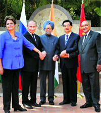PM Manmohan Singh with (L-R) Brazilian President Dilma Rousseff, Russian President Vladimir Putin, Chinese President Hu Jintao and South African President Jacob Zuma at Los Cabos in Mexico on Monday.