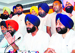 Cabinet minister Bikram Singh Majithia (2nd from right) along with CPS IS Bolaria (R) address the media in Amritsar on Saturday