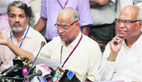 RA Mashelkar (R), chairman of IIT-Gandhinagars Board of Directors, with IIT Madras chairman MM Sharma (C) and IIT Delhi director RK Shevgaonka address the media in New Delhi after Wednesdays decision.  PTI