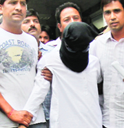 Abu Jundal being taken to a hospital in New Delhi