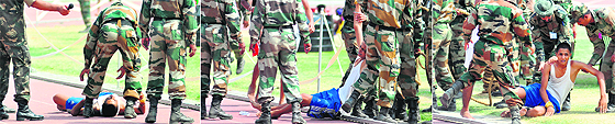 Some ran bare feet and others wore socks to save their feet from the scorching heat on the first day of the Army recruitment drive conducted at Guru Nanak Stadium in Ludhiana on Monday. Nearly 4,500 participants from the Moga district participated in the drive. The mercury, which was around 40° C mark, took its toll on candidates as a few of them were seen slipping and falling. While the youths participating in the recruitment drive were complaining that the trials were conducted in inhuman conditions, the Army was miffed over the decreasing physical standards of the youth. Refusing to participate in the 1,600m running competition, a group of candidates from Moga complained that the recruitment agency was making them run in the group of over 125 candidates. “We have seen in the morning also that the candidates were pushing and knocking each other in order to win the race. Many boys received injuries during the race. We are here to get selected in the Army, not to sustain injury,” said one of the youths from Moga.